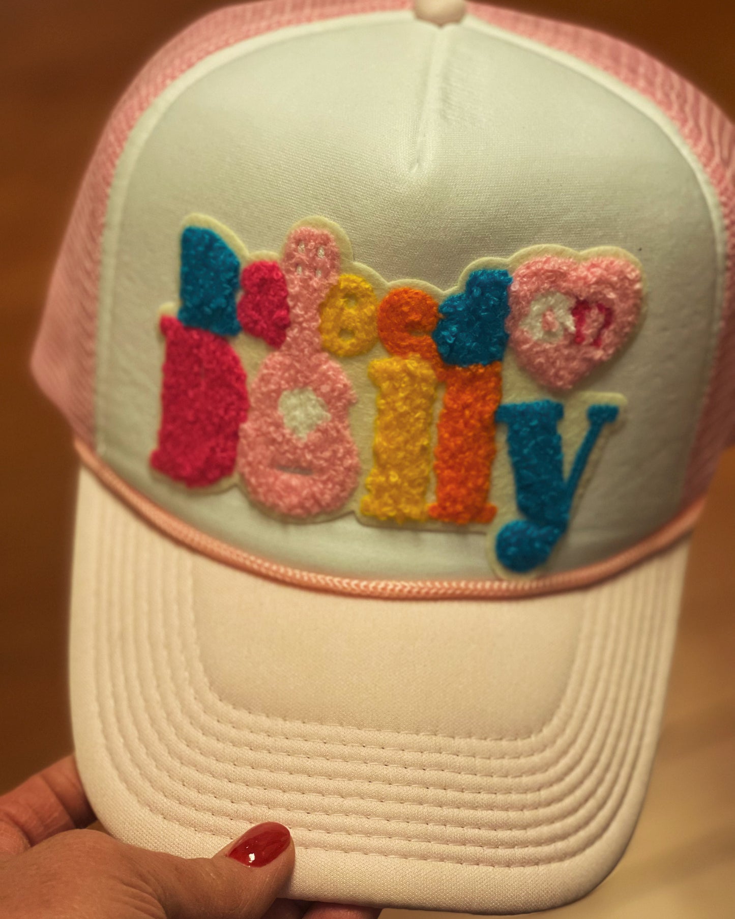 “Raised on Dolly” trucker hat